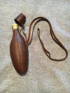 Leather covered soda bottle